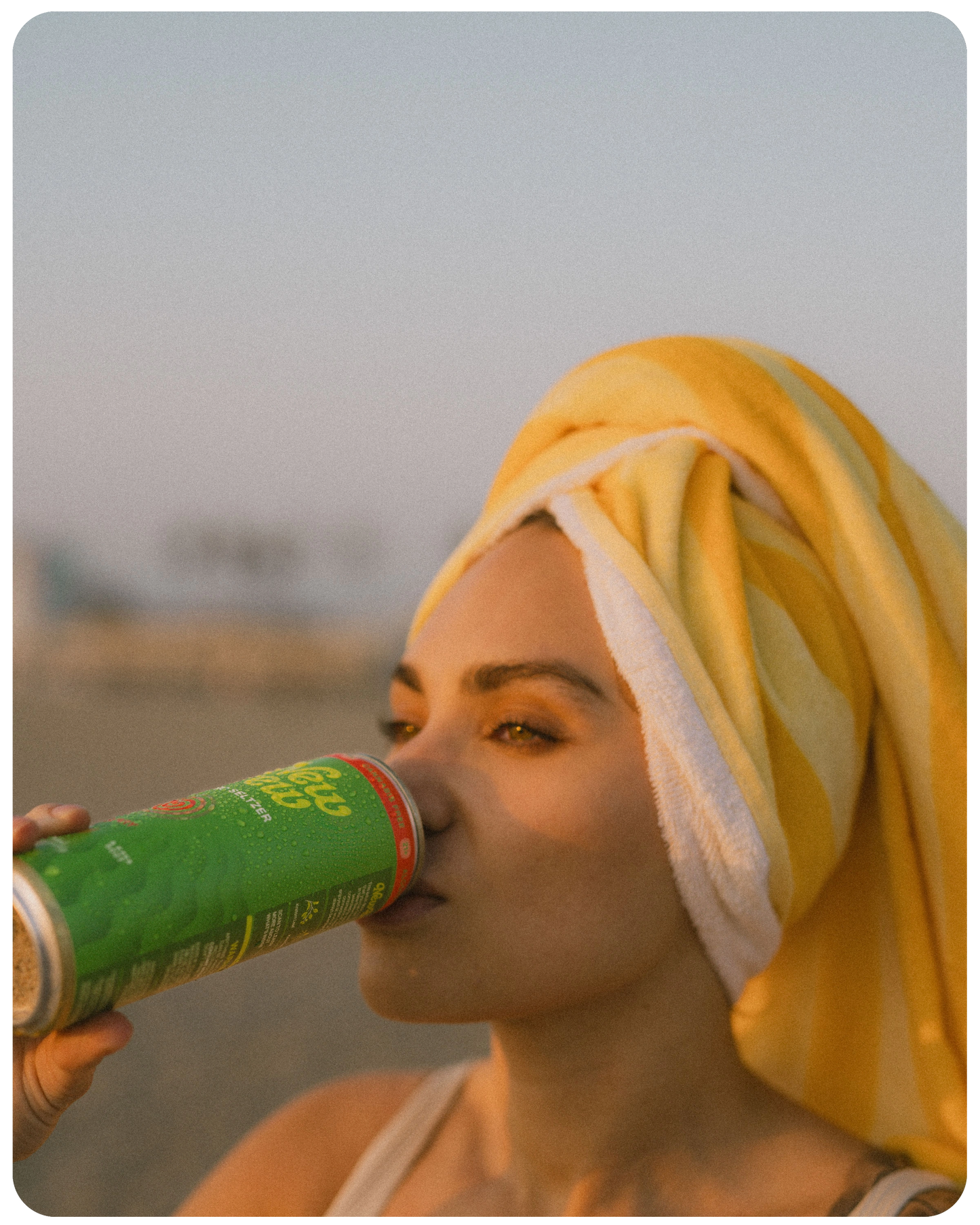 Woman drinking New Brew Berry