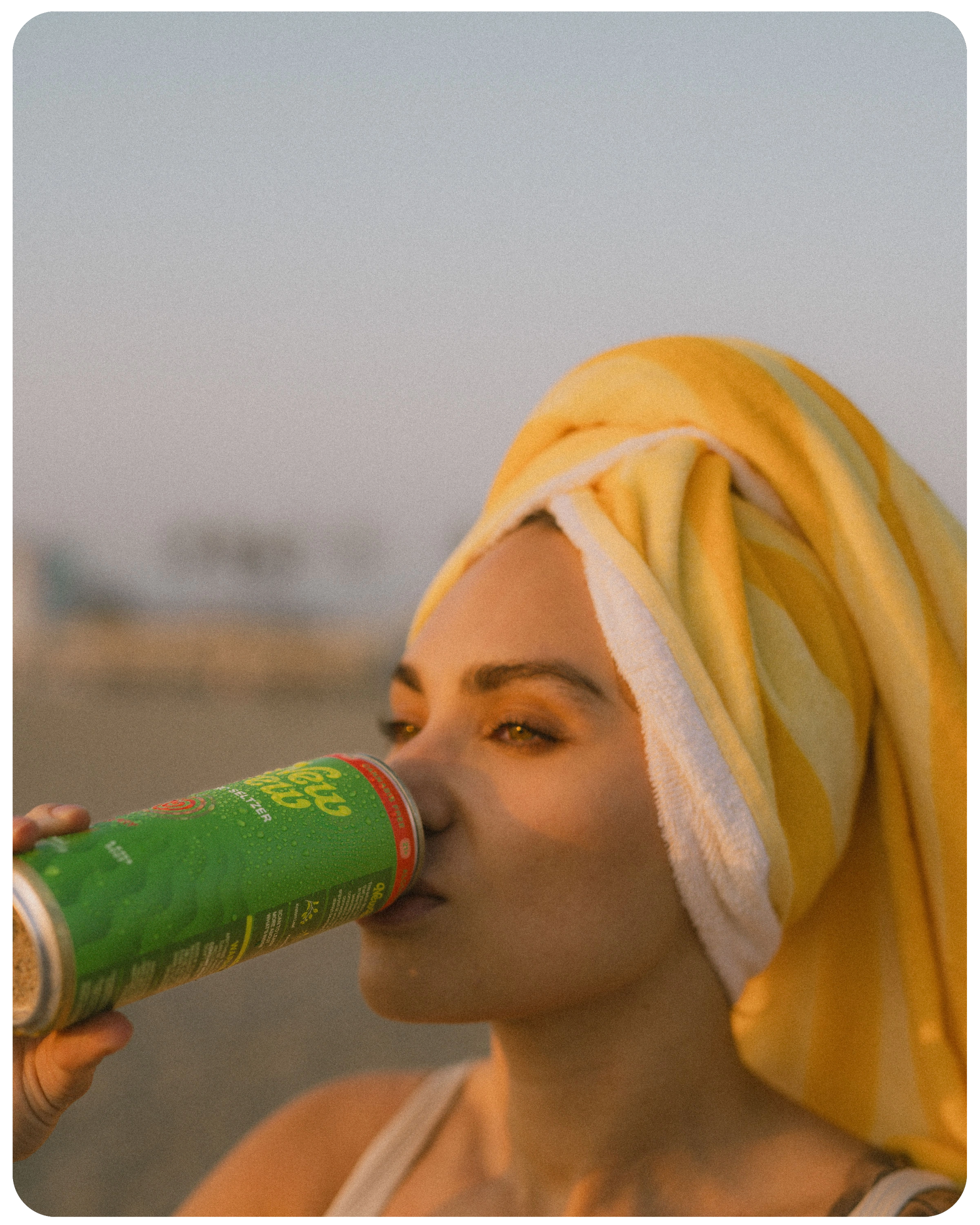 Woman drinking New Brew Berry